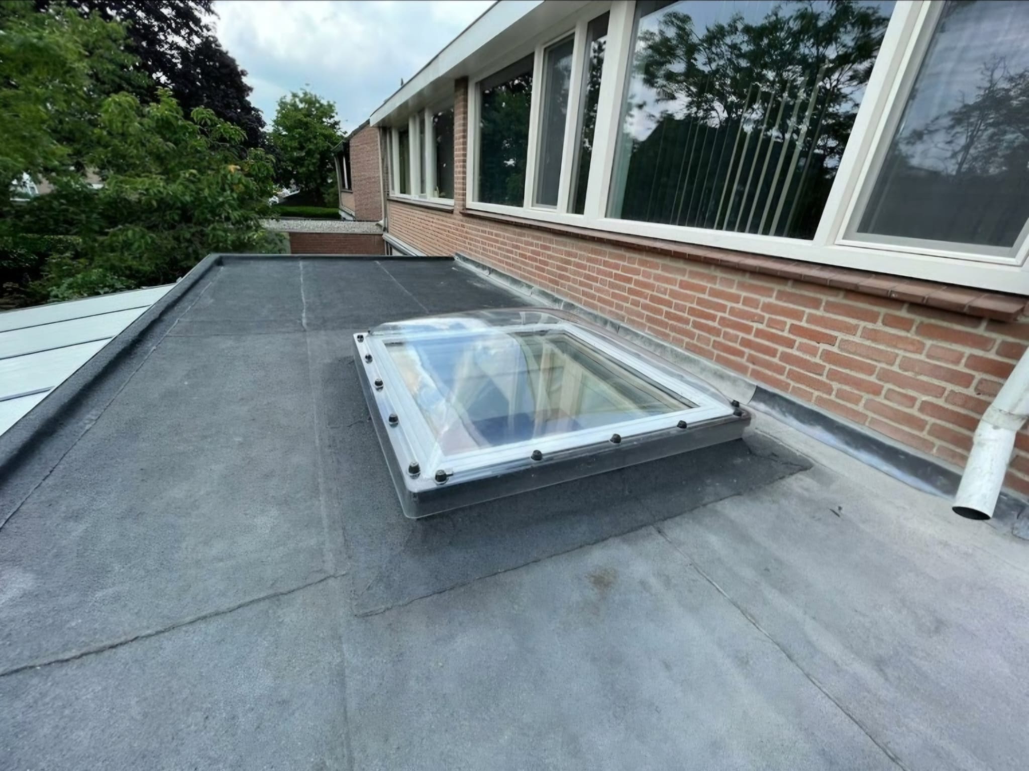 Lichtkoepels plat dak